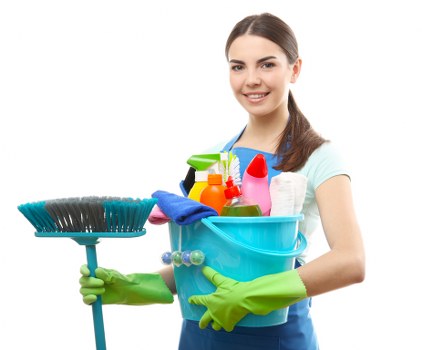 Local cleaner preparing a guest-ready bedroom in Chelsea